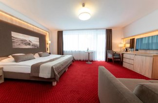 Hotele 4**** - Hotel Unitral - Pokoje - zdjęcie 5 