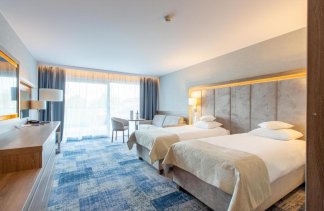 Hotele 4**** - Hotel Unitral - Pokoje - zdjęcie 1 